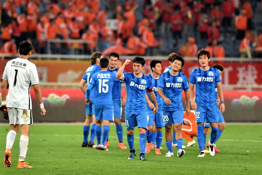 aoa体育-广州富力负于山东鲁能，遭遇失利